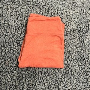 Salmon color LuLaRoe leggings that’s are one size and are very soft and stretchy